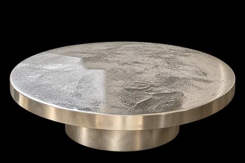 Round textured metal table